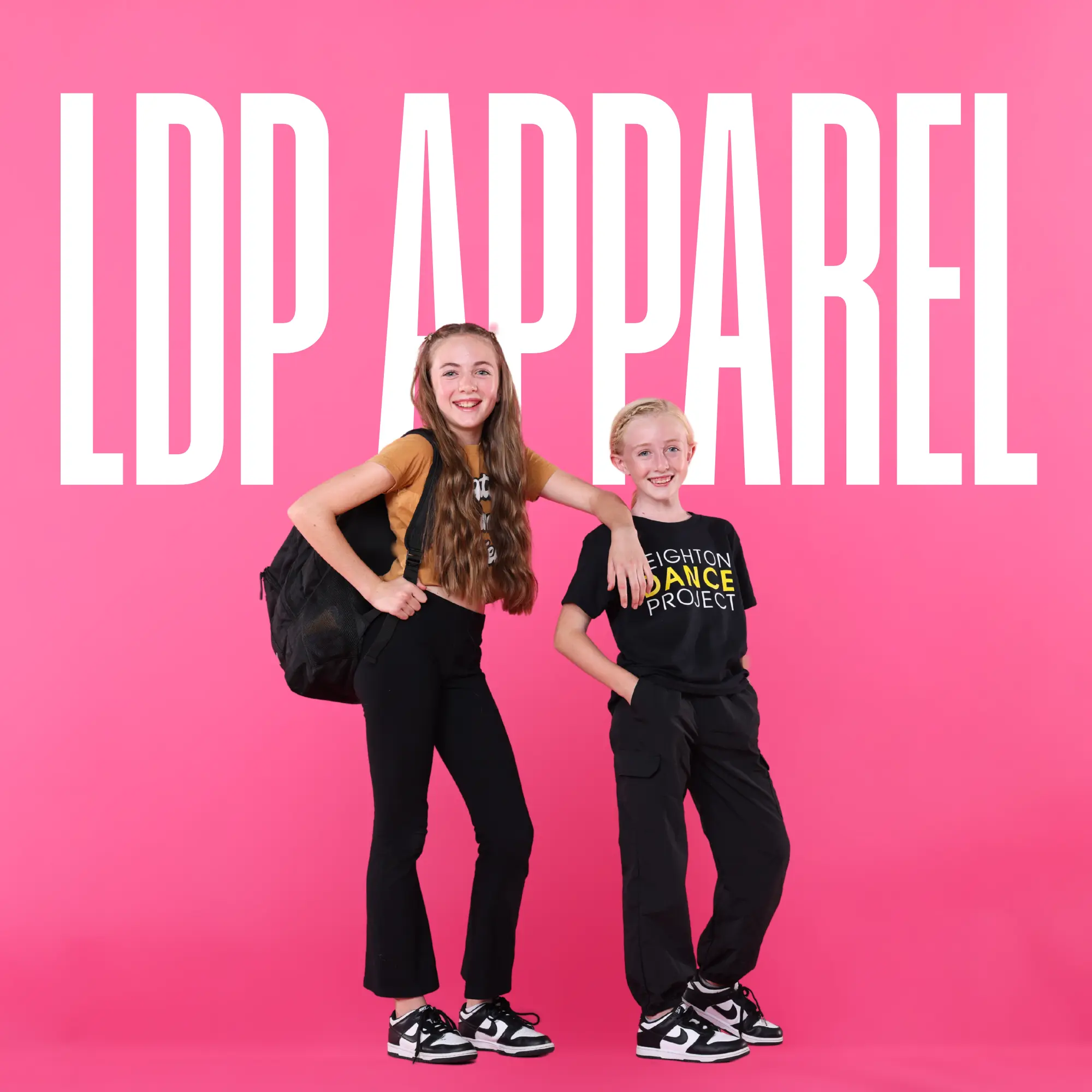 Two dancers wearing Leighton Dance Project branded apparel